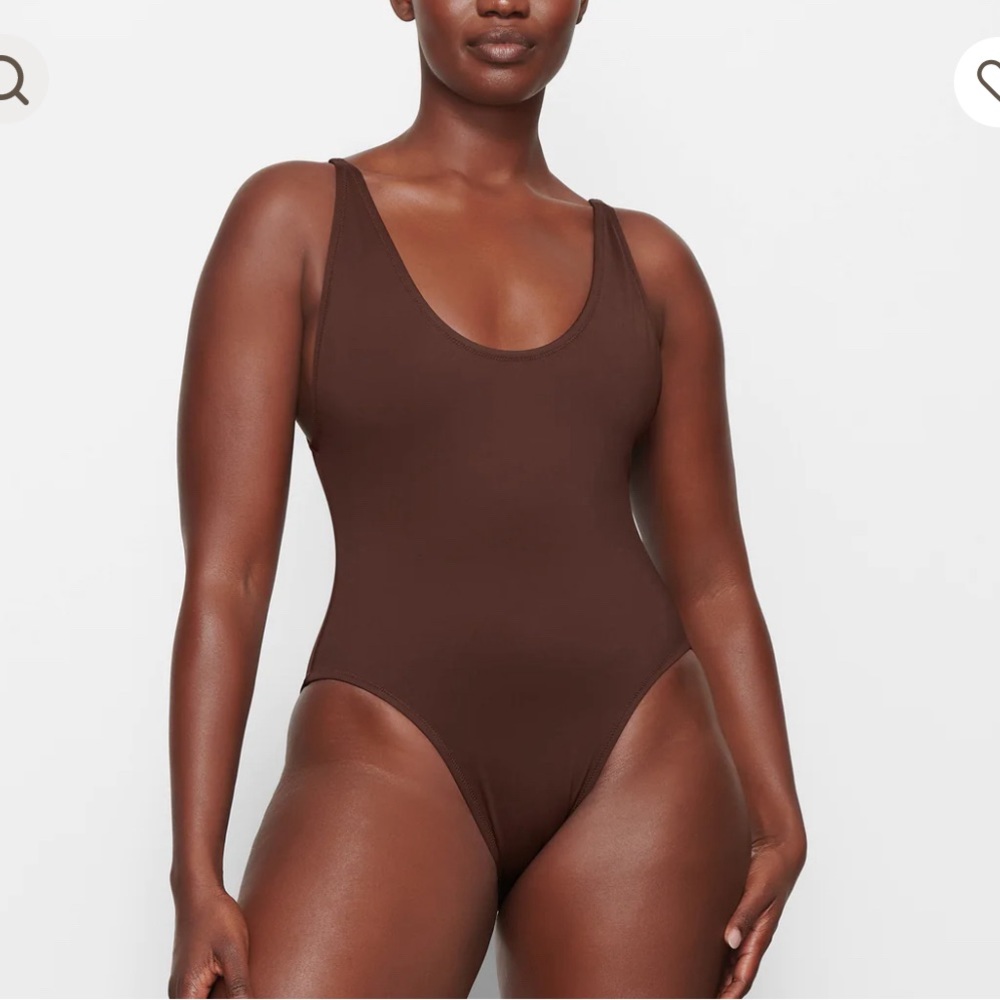 Skims one piece swimsuit never worn! Size medium